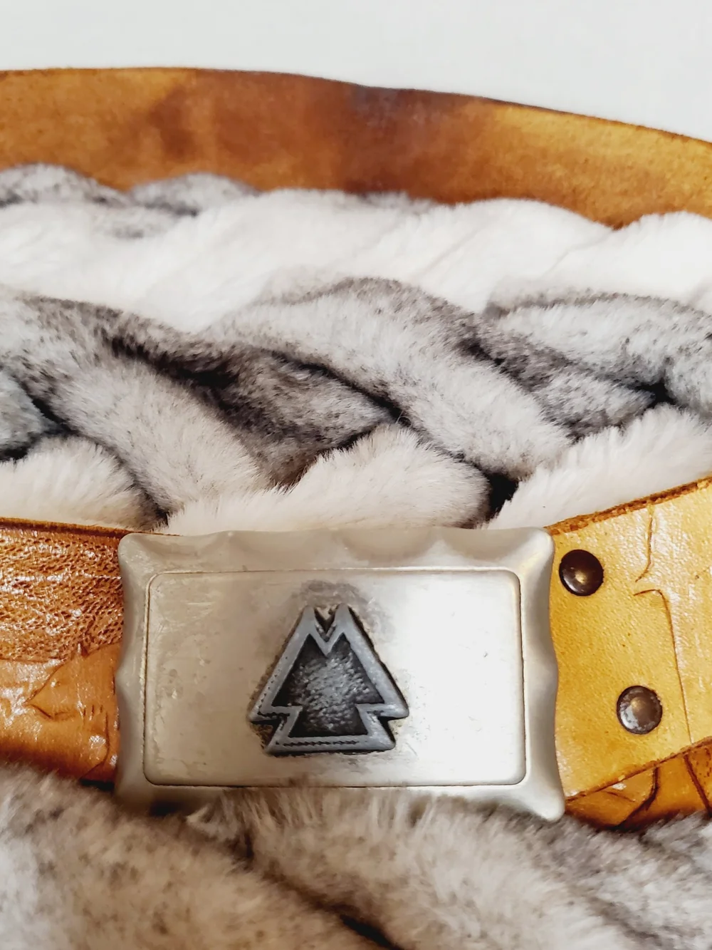 Vintage hand-tooled leather belt features a distinctive Viking Valknut symbo